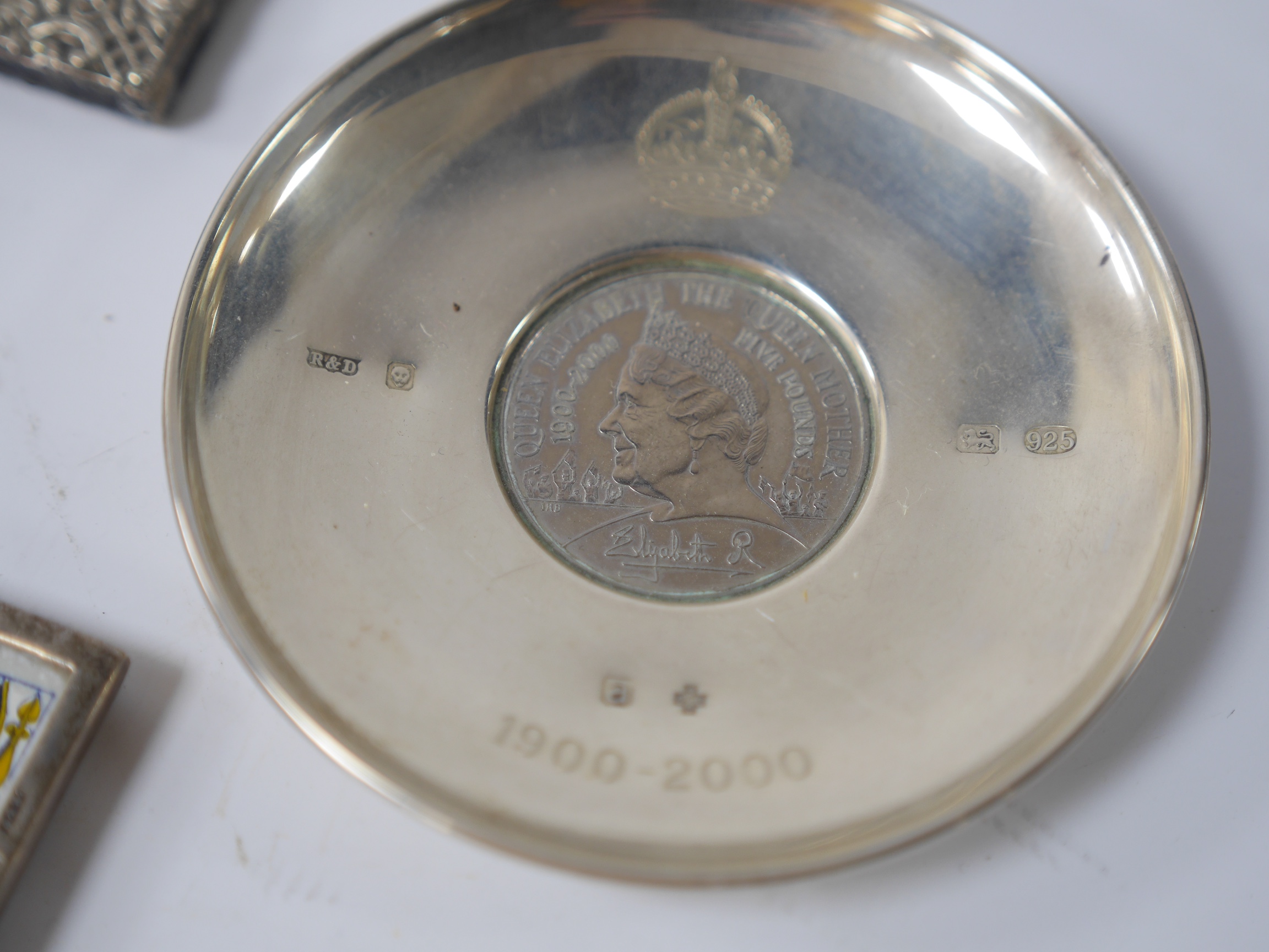 Four small mounted photograph frames, including a double by Saunders & Shepherd, Birmingham, 1905, 45mm, a silver dish, a silver napkin ring and five items of silver flatware. Condition - poor to fair